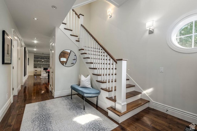 stairs with baseboards, recessed lighting, and hardwood / wood-style floors