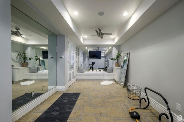 1137 S Douglas St E, Salt Lake City, UT 84105 - hall featuring baseboards, a tray ceiling, and recessed lighting