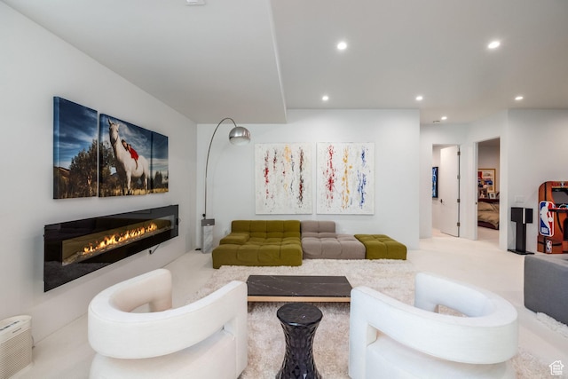 405 N Virginia St, Salt Lake City, UT 84103 - carpeted living room featuring a glass covered fireplace and recessed lighting