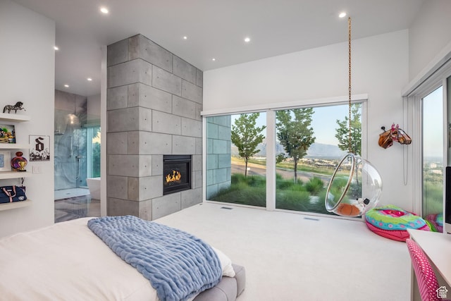 405 N Virginia St, Salt Lake City, UT 84103 - bedroom with recessed lighting and a tile fireplace