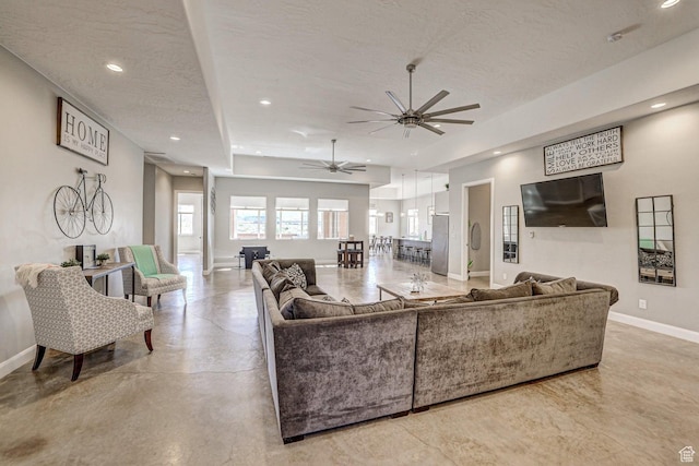 3243 S 4900 W, Hurricane, UT 84737 - living area featuring a textured ceiling, baseboards, ceiling fan, and recessed lighting