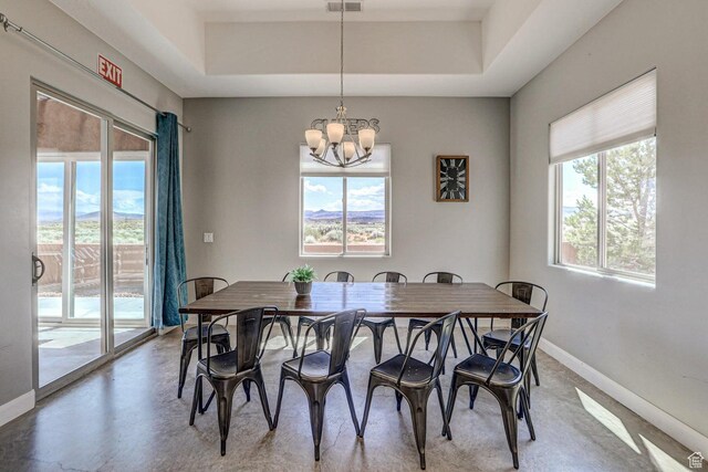 3243 S 4900 W, Hurricane, UT 84737 - dining room with finished concrete flooring, visible vents, a chandelier, baseboards, and a raised ceiling