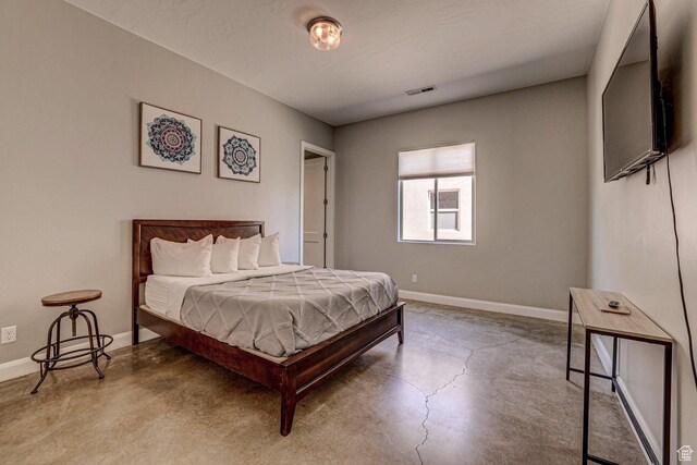 3243 S 4900 W, Hurricane, UT 84737 - bedroom with finished concrete flooring, baseboards, and visible vents