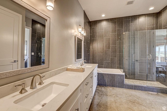 3243 S 4900 W, Hurricane, UT 84737 - bathroom featuring double vanity, visible vents, a tile shower, and a sink