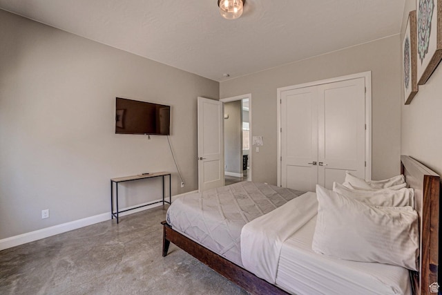 3243 S 4900 W, Hurricane, UT 84737 - bedroom featuring baseboards, a closet, and concrete flooring