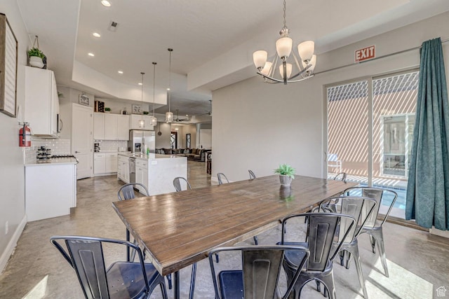 3243 S 4900 W, Hurricane, UT 84737 - dining area with visible vents, recessed lighting, finished concrete floors, a raised ceiling, and a notable chandelier