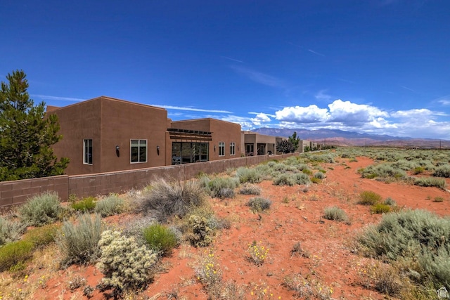 3243 S 4900 W, Hurricane, UT 84737 - back of house featuring fence and a mountain view