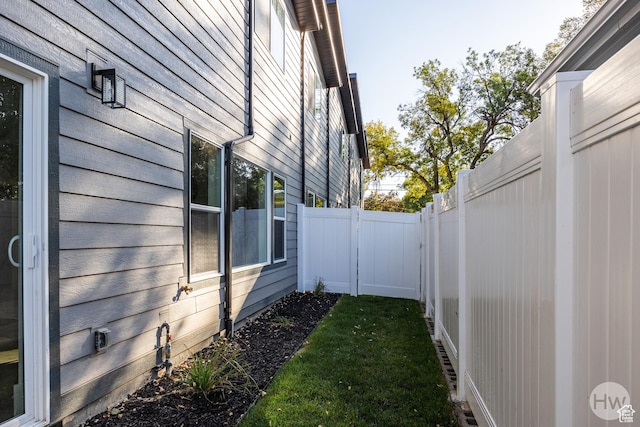 608 E Simpson Ave S, Salt Lake City, UT 84106 - view of home's exterior with a fenced backyard and a lawn