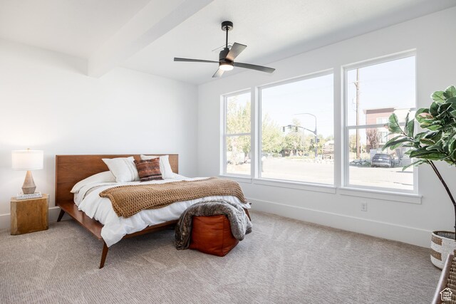608 E Simpson Ave S, Salt Lake City, UT 84106 - bedroom featuring carpet floors, ceiling fan, multiple windows, and beamed ceiling