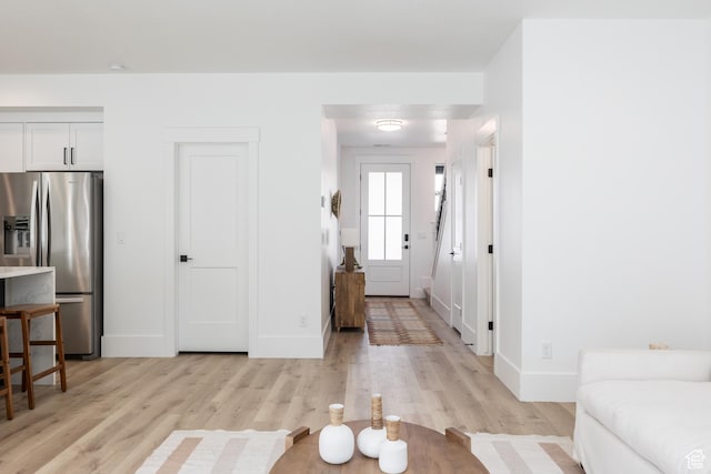 608 E Simpson Ave S, Salt Lake City, UT 84106 - foyer with light wood-type flooring and baseboards