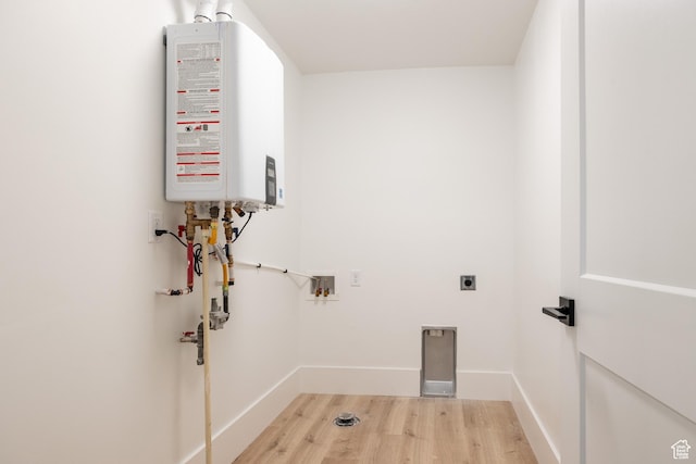 608 E Simpson Ave S, Salt Lake City, UT 84106 - washroom with hookup for a washing machine, laundry area, light wood-style floors, water heater, and electric dryer hookup