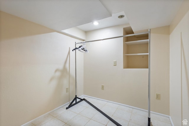 331 W 200 N, Delta, UT 84624 - interior space with laundry area, light tile patterned floors, and baseboards