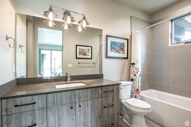 full bath featuring shower / tub combo, toilet, and vanity