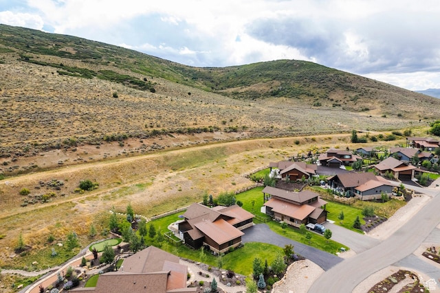 birds eye view of property featuring a residential view and a mountain view
