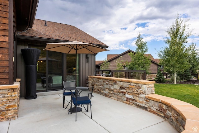 view of patio with a grill
