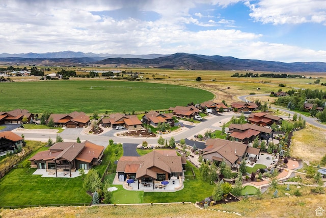 aerial view with a mountain view and a residential view