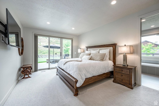 bedroom with a textured ceiling, carpet floors, baseboards, access to outside, and recessed lighting