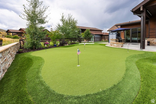 view of property's community with a patio area and fence