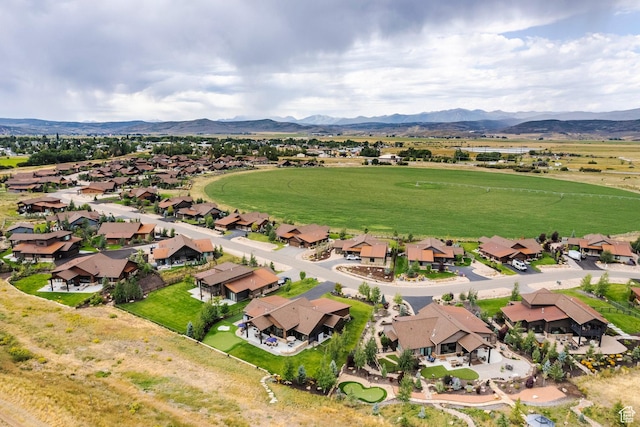 drone / aerial view with a mountain view and a residential view