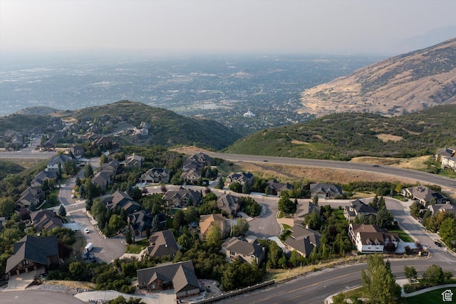 aerial view featuring a mountain view and a residential view