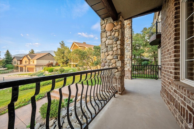 balcony featuring a residential view