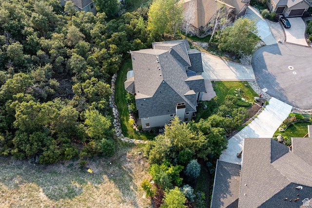 birds eye view of property with a residential view