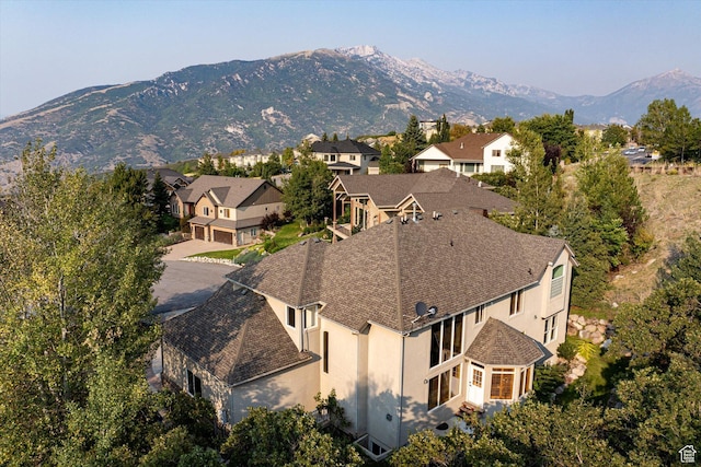 aerial view featuring a mountain view and a residential view