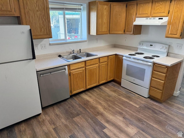 1775 N Railroad St W, Lehi, UT 84043 - kitchen featuring under cabinet range hood, white appliances, dark wood-type flooring, a sink, and light countertops