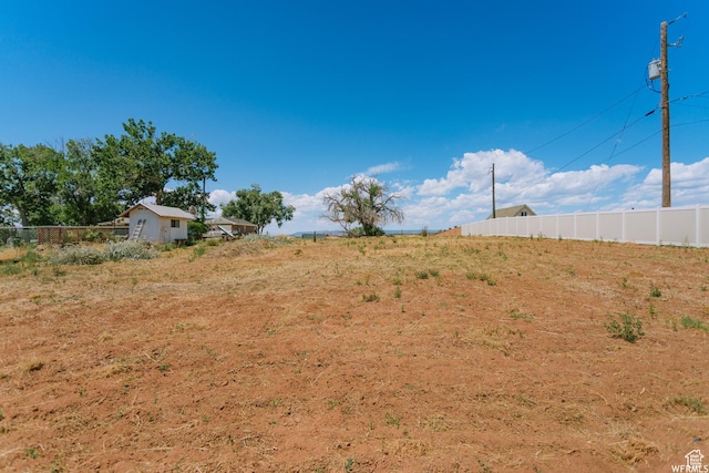 view of yard featuring fence