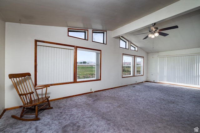 unfurnished room with carpet floors, vaulted ceiling with beams, baseboards, and a ceiling fan