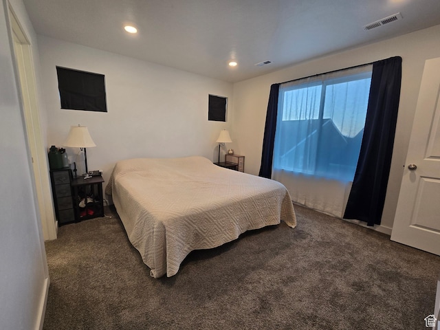 carpeted bedroom featuring visible vents and recessed lighting