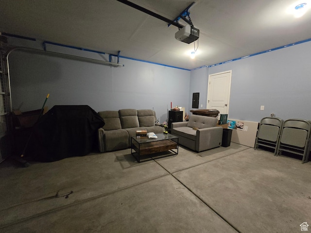 garage with electric panel and a garage door opener