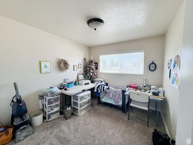 carpeted bedroom with a textured ceiling
