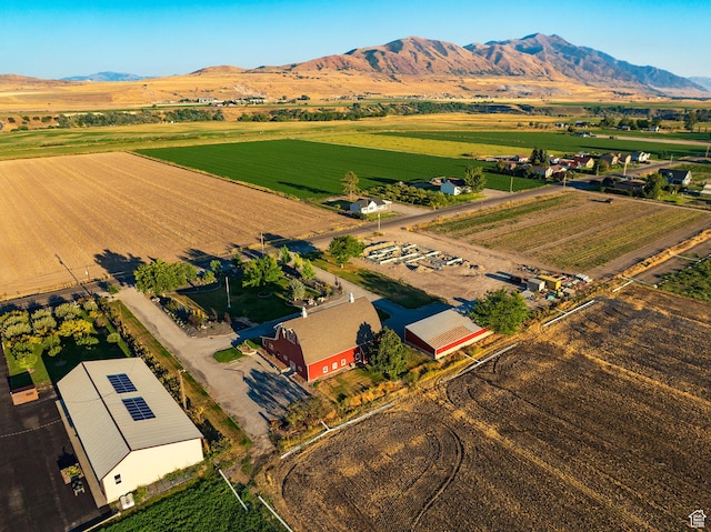 birds eye view of property featuring a mountain view and a rural view