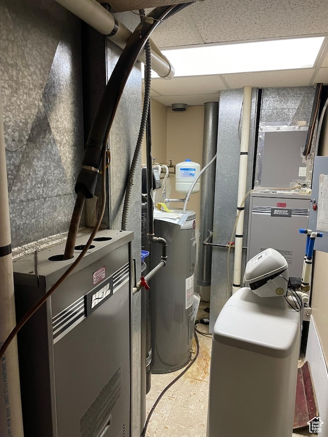 utility room featuring electric water heater