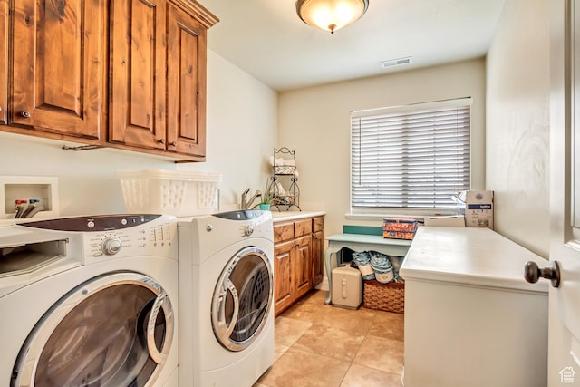 2118 S Centennial Blvd S, Saratoga Springs, UT 84045 - clothes washing area featuring cabinet space, washing machine and clothes dryer, and light tile patterned floors