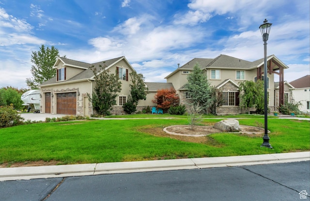 2118 S Centennial Blvd S, Saratoga Springs, UT 84045 - traditional home featuring stucco siding, stone siding, and concrete driveway