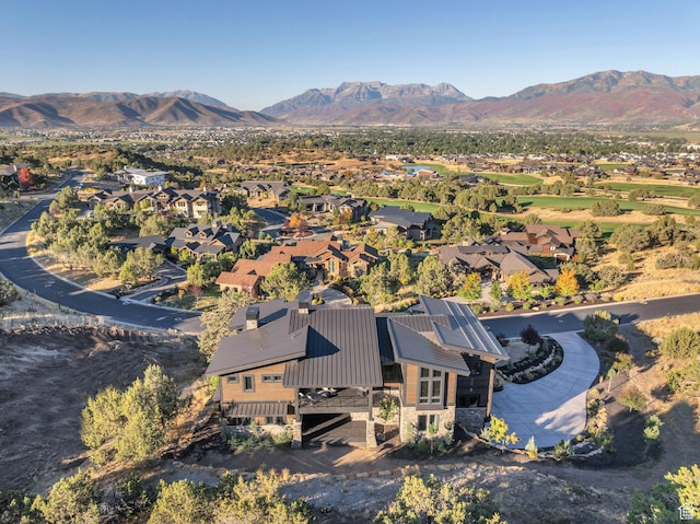 aerial view with a mountain view and a residential view