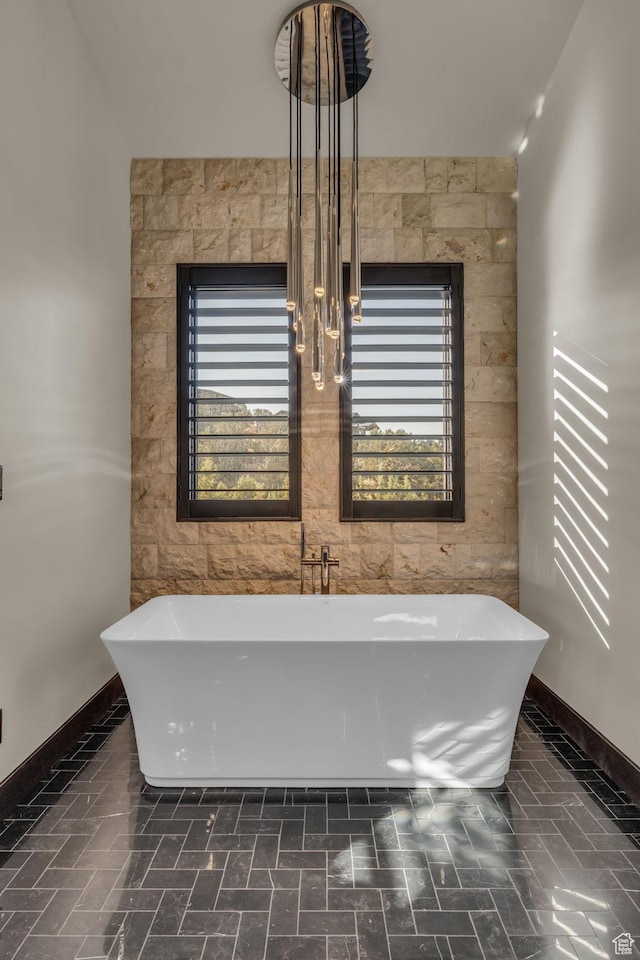 bathroom featuring a freestanding tub