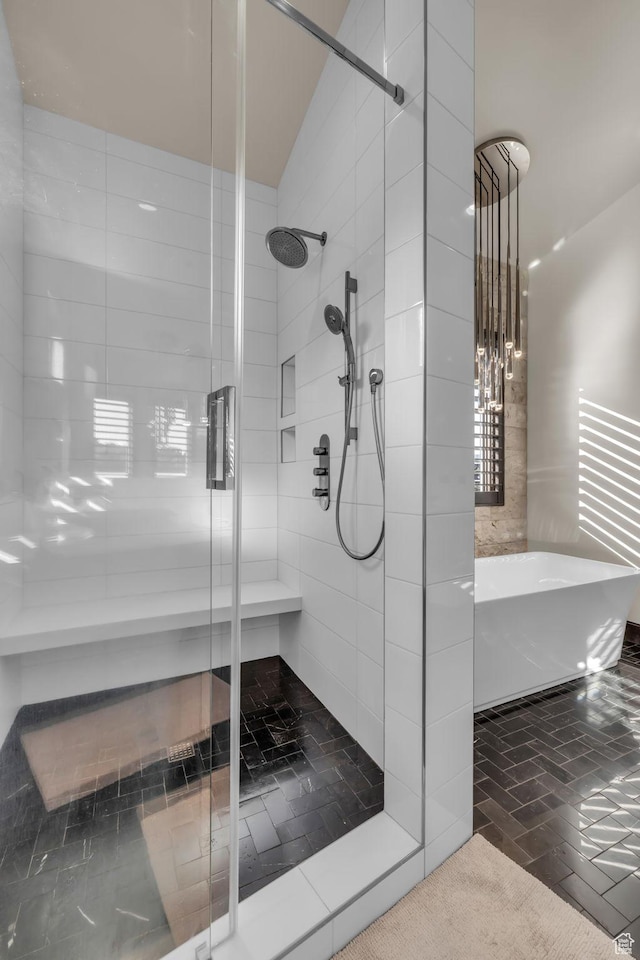 bathroom with a shower stall