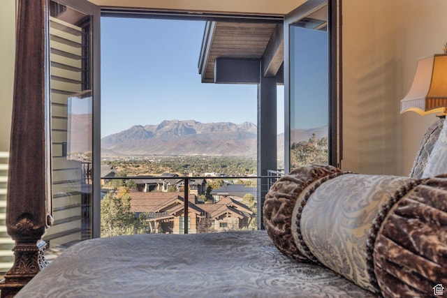 bedroom with a mountain view