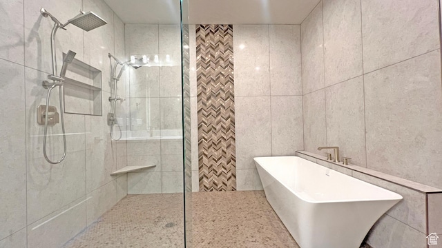 5178 W 2150 S, Hurricane, UT 84737 - bathroom with a walk in shower and a soaking tub