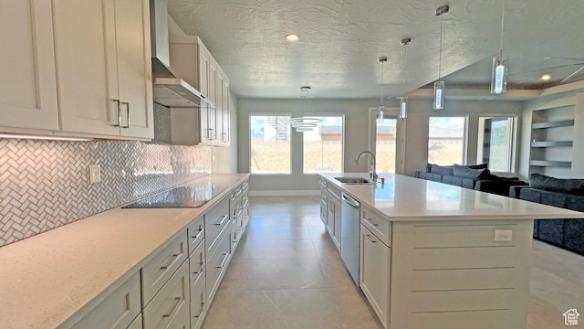 5178 W 2150 S, Hurricane, UT 84737 - kitchen with a sink, black electric cooktop, stainless steel dishwasher, wall chimney range hood, and light countertops