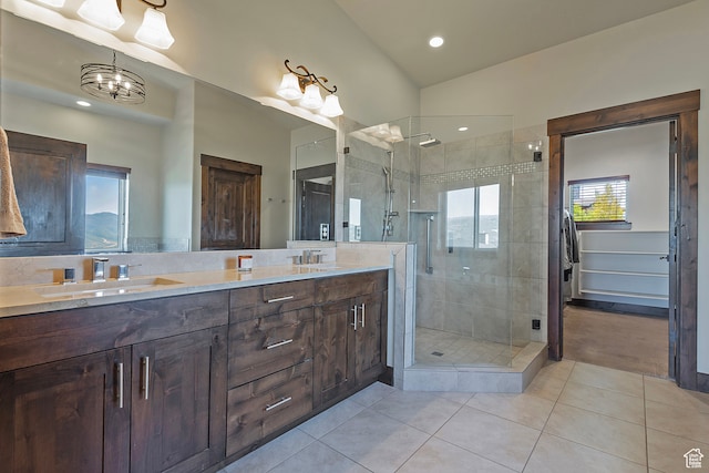 1375 E Lasso Trl, Hideout, UT 84036 - bathroom with vanity, vaulted ceiling, a shower with shower door, and tile patterned flooring