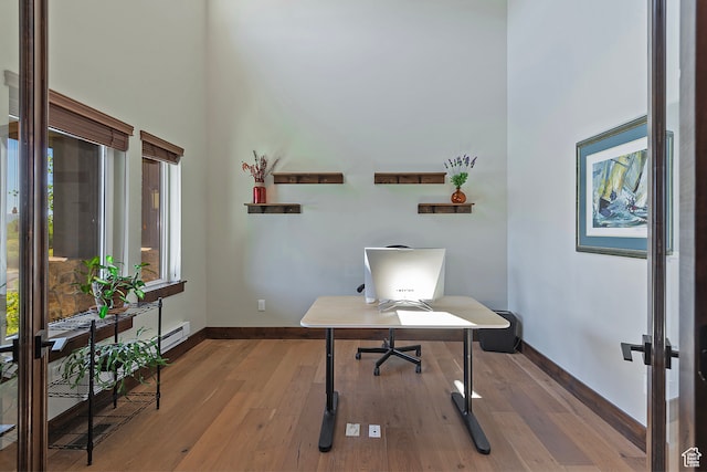 1375 E Lasso Trl, Hideout, UT 84036 - home office featuring plenty of natural light, a towering ceiling, and hardwood / wood-style floors