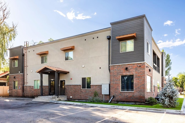 67 E 500 S Unit B102, Heber City, UT 84032 - view of building exterior with uncovered parking