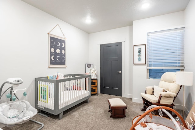 67 E 500 S Unit B102, Heber City, UT 84032 - bedroom with a crib, carpet floors, baseboards, and recessed lighting
