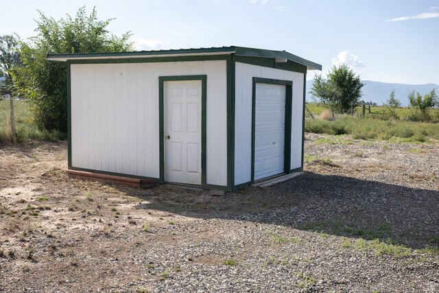 566 S Main St, Lyman, UT 84749 - view of outdoor structure with a mountain view