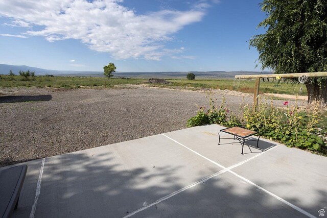 566 S Main St, Lyman, UT 84749 - view of patio / terrace featuring a view of countryside