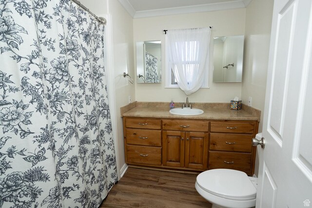 566 S Main St, Lyman, UT 84749 - full bathroom with vanity, wood finished floors, toilet, a shower with shower curtain, and ornamental molding